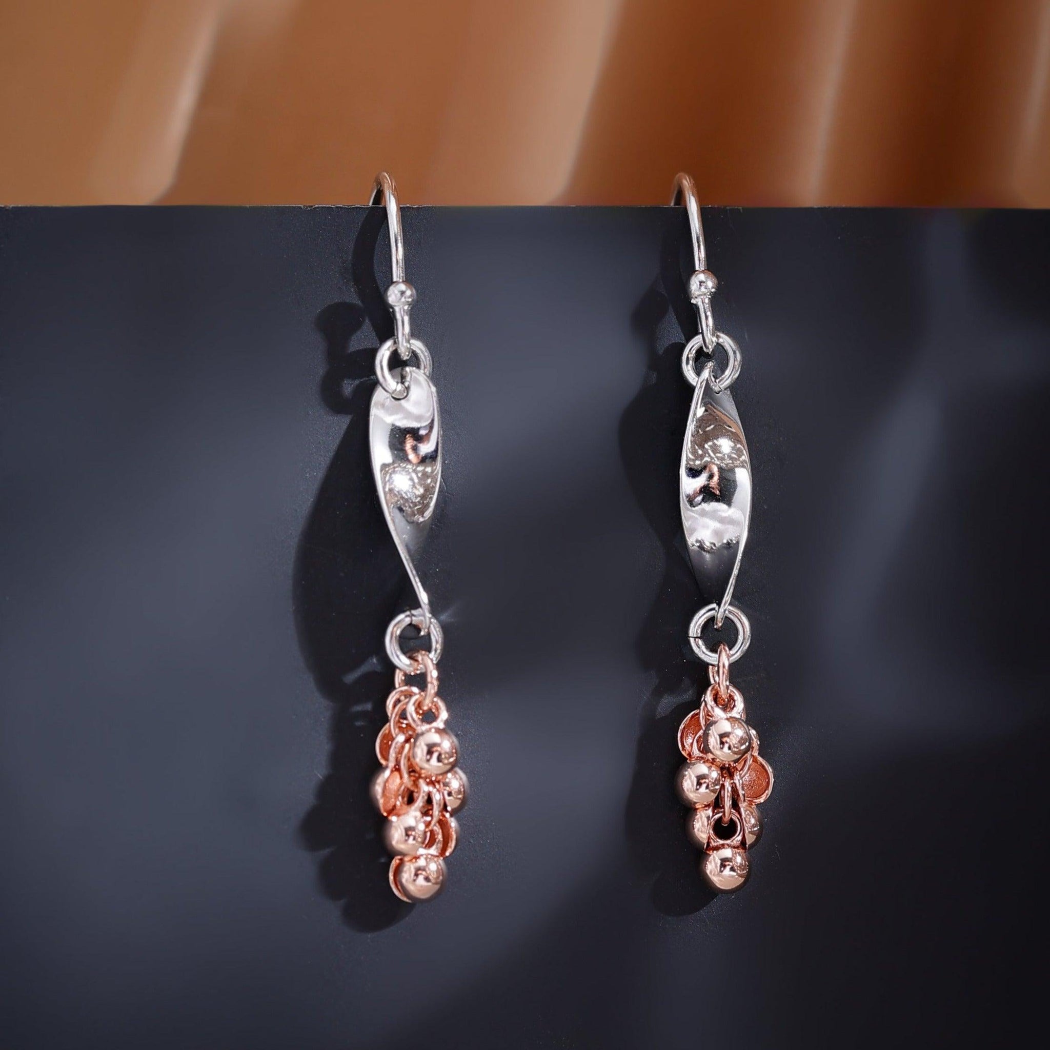 Rose gold twist earrings